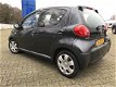 Toyota Aygo - 1.0i-12V 5DR AIRCO ELECTR.RAMEN C.SLOT OP AFSTAND DEALER-ONDERHOUDEN MET ONDERHOUDSHIS - 1 - Thumbnail