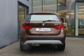 BMW X1 - sDrive18i Executive / Navigatie / Cruise Control - 1 - Thumbnail