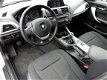 BMW 1-serie - 116i Business | Navigatie | Bluetooth | USB | Cruise Control - 1 - Thumbnail