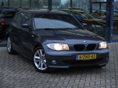 BMW 1-serie - 120D 5-DRS AUT. | NAVI | LEDER | SPORTSTOELEN | CRUISE - 1