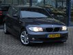 BMW 1-serie - 120D 5-DRS AUT. | NAVI | LEDER | SPORTSTOELEN | CRUISE - 1 - Thumbnail