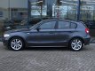BMW 1-serie - 120D 5-DRS AUT. | NAVI | LEDER | SPORTSTOELEN | CRUISE - 1 - Thumbnail