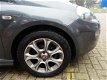 Fiat Punto Evo - 0.9 TwinAir Lounge AUTOM. AIRCO CRUISE CONTROL Financiering vanaf € 167, 00 per maa - 1 - Thumbnail