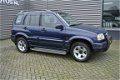 Suzuki Grand Vitara - 2.0 4WD , AIRCO , LMV , TH AFN - 1 - Thumbnail