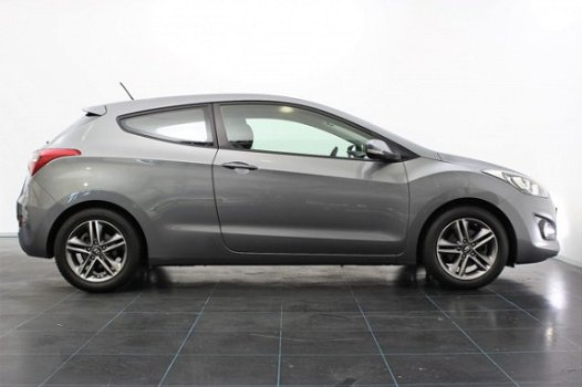 Hyundai i30 - 1.4 i-Motion Plus | Radio-CD/MP3 Speler | Cruise & Climate Control | Park. Sensor | Bl - 1