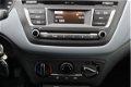 Hyundai i20 - 1.2 HP i-Drive Cool | Airco | Unieke Km-stand - 1 - Thumbnail