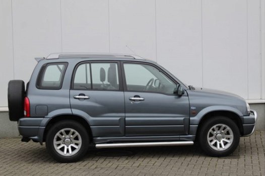 Suzuki Grand Vitara - 2.0 FreeStyle-3 | Clima | Leder | Park sens | Lm-Velgen | Trekhaak - 1