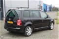 Volkswagen Touran - 2.0 TDI Highline Bomvol Xenon-Clima - 1 - Thumbnail