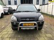 Hyundai Tucson - 2.0i Dynamic Cross - 1 - Thumbnail