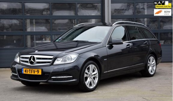 Mercedes-Benz C-klasse Estate - 180 Business Class Avantgarde * DEALER ONDERHOUDEN * PANORAMA * LEER - 1