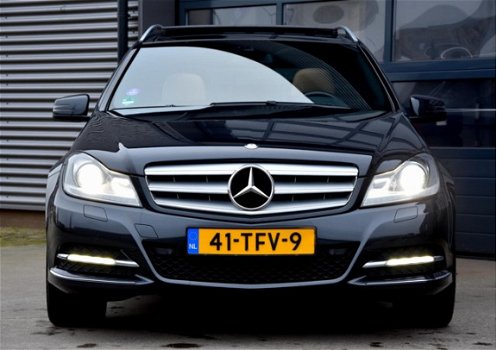 Mercedes-Benz C-klasse Estate - 180 Business Class Avantgarde * DEALER ONDERHOUDEN * PANORAMA * LEER - 1