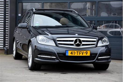Mercedes-Benz C-klasse Estate - 180 Business Class Avantgarde * DEALER ONDERHOUDEN * PANORAMA * LEER - 1