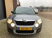 Skoda Yeti - 1.2 TSI Ambition |Navi|PDC|Clima|Cruise|Zeer netjes| - 1 - Thumbnail