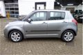 Suzuki Swift - 1.3 GLS Automaat 5 deurs - 1 - Thumbnail