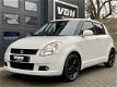 Suzuki Swift - 1.3 EDITION - AIRCO - 5DRS - EL PAKKET - NAVI - 1 - Thumbnail