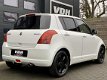 Suzuki Swift - 1.3 EDITION - AIRCO - 5DRS - EL PAKKET - NAVI - 1 - Thumbnail