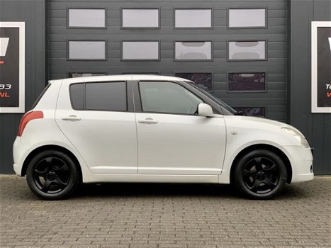 Suzuki Swift - 1.3 EDITION - AIRCO - 5DRS - EL PAKKET - NAVI - 1