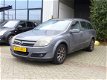 Opel Astra Wagon - 1.9 CDTi Enjoy , PDC, Trekhaak, Airco - 1 - Thumbnail