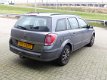 Opel Astra Wagon - 1.9 CDTi Enjoy , PDC, Trekhaak, Airco - 1 - Thumbnail