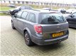 Opel Astra Wagon - 1.9 CDTi Enjoy , PDC, Trekhaak, Airco - 1 - Thumbnail