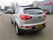 Kia Sportage - 1.6 GDI X-ecutive Plus Pack /1STE EIG/PDC/NAVI/AIRCO/NAP - 1 - Thumbnail