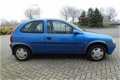 Opel Corsa - 1.2i-16V Strada - lage km stand -trekhaak - 1 - Thumbnail