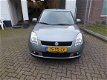 Suzuki Swift - 1.3 Exclusive Automaat/Airco - 1 - Thumbnail