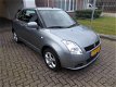 Suzuki Swift - 1.3 Exclusive Automaat/Airco - 1 - Thumbnail