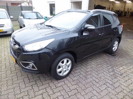 Hyundai ix35 - 2.0i Style /Panodak/Trekhaak/Half leder - 1