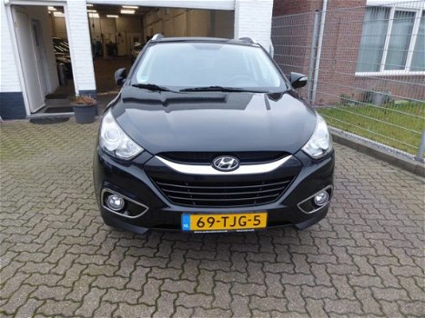 Hyundai ix35 - 2.0i Style /Panodak/Trekhaak/Half leder - 1