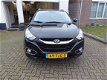 Hyundai ix35 - 2.0i Style /Panodak/Trekhaak/Half leder - 1 - Thumbnail