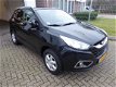 Hyundai ix35 - 2.0i Style /Panodak/Trekhaak/Half leder - 1 - Thumbnail