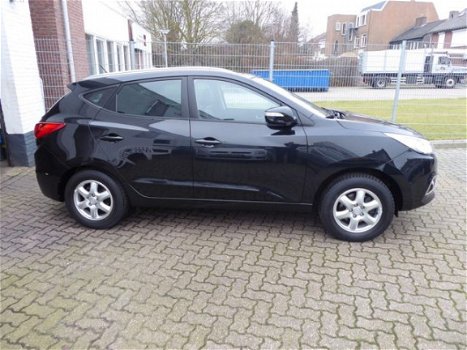 Hyundai ix35 - 2.0i Style /Panodak/Trekhaak/Half leder - 1