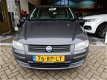 Fiat Stilo - 1.4-16V Young nette stilo, weinig km.stand parkeersenor achter.airco - 1 - Thumbnail