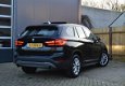 BMW X1 - 2.0i Essential AUT Panorama/Leer/LED Origineel NL - 1 - Thumbnail