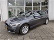 BMW 1-serie - 116i high executive - 1 - Thumbnail