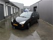 Ford Focus Wagon - 1.4-16V Ambiente - 1 - Thumbnail