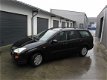 Ford Focus Wagon - 1.4-16V Ambiente - 1 - Thumbnail