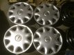 4 Stalen Velgen Opel Zafira Meriva 15 Inch 5x110 Wieldoppen - 1 - Thumbnail