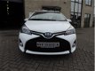 Toyota Yaris - 1.5 Hybrid Lease Limited Automaat, L.M.velgen, van eerste eigenaar - 1 - Thumbnail