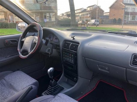 Suzuki Swift - 1.0 Sensation 2000 Stuurbekrachtiging Nieuwe banden Navi NAP - 1