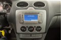 Ford Focus - 1.6 TDCI Style Navi - 1 - Thumbnail