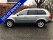 Volvo XC90 - D5 185pk Awd Geartronic Grijs kenteken Nw model 232dkm - 1 - Thumbnail