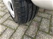 Opel Corsa - 1.4i Strada automaat stuurbekrachtiging - 1 - Thumbnail