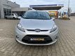 Ford Fiesta - 1.25 Ghia //2E EIGENAAR//AIRCO//STOELVERWARMING//SPRAAK BEDIENNING//STUURWIEL BEDIENIN - 1 - Thumbnail