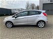 Ford Fiesta - 1.25 Ghia //2E EIGENAAR//AIRCO//STOELVERWARMING//SPRAAK BEDIENNING//STUURWIEL BEDIENIN - 1 - Thumbnail