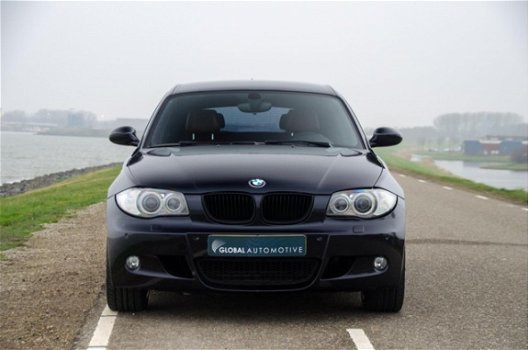 BMW 1-serie - 118i High Executive Limited Sport Edition - CARBONZWART - LEER - NAVIGATIE - 1