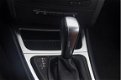 BMW 1-serie - 118i High Executive Limited Sport Edition - CARBONZWART - LEER - NAVIGATIE - 1 - Thumbnail