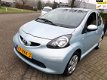 Toyota Aygo - 1.0-12V (bj 2006) 5-DEURS *85.231 ORG KM* NW APK - 1 - Thumbnail