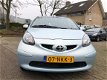 Toyota Aygo - 1.0-12V (bj 2006) 5-DEURS *85.231 ORG KM* NW APK - 1 - Thumbnail